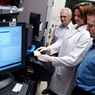 A group of researchers reviewing their findings