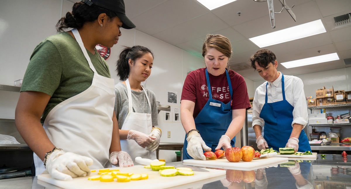 Students learning how to cook for themselves