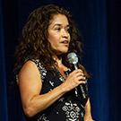 Miriam Nuno speaking at an event.