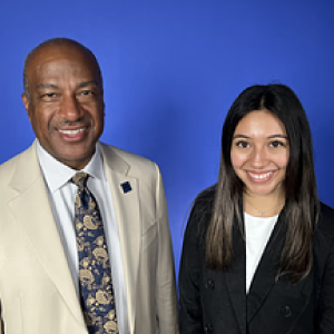 Chancellor Gary S. May and student Stephanie Jiminez
