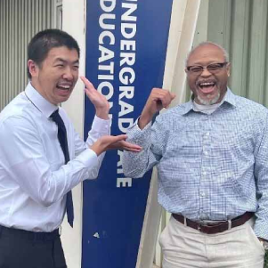 Vice Provost and Dean for Undergraduate Education Michael Bradford and student Pat Feng