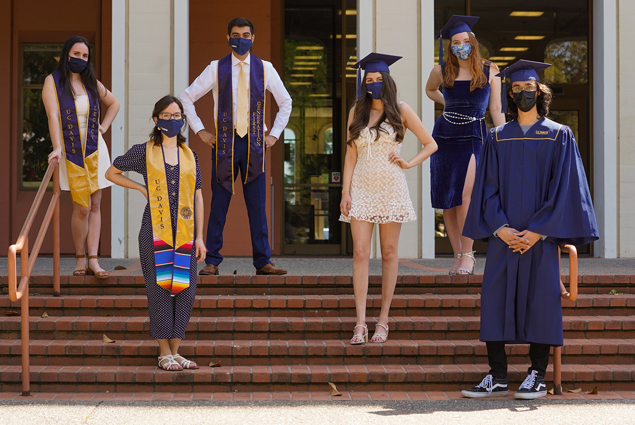 Students in grad caps with face coverings.