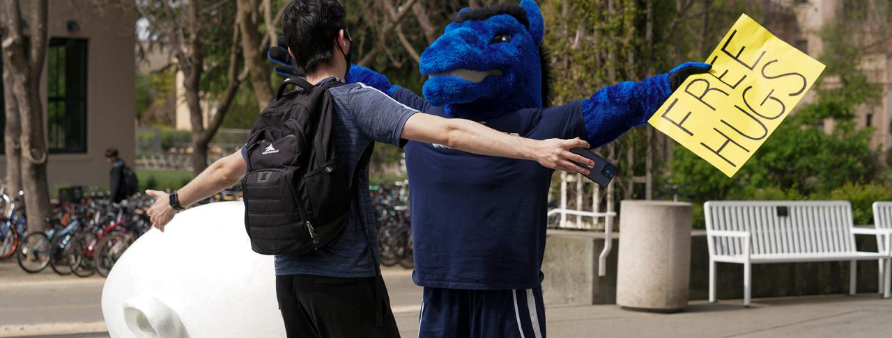 man hugging gunrock