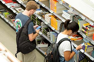 Students browse for textbooks in 2019