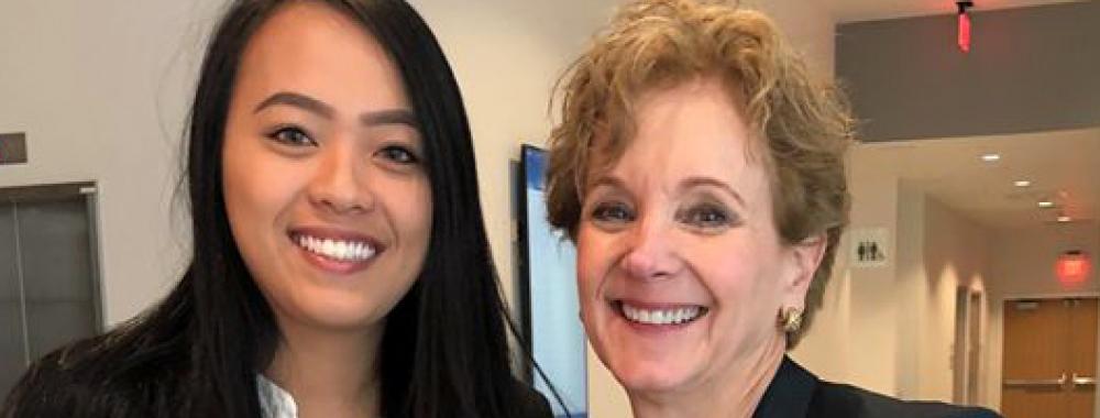 UC Davis student Thanh Huynh poses with Dean Allison Brashear.