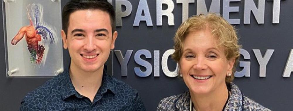 UC Davis student Matthew Lima poses with School of Medicine Dean Allison Brashear