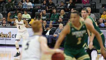 UC Davis Chancellor Gary May attends the UC Davis Men’s Basketball game against Sac State at the Golden One Center.