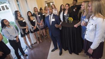 Chancellor Gary May gives a tour of the Chancellor’s residence to the men's and women's basketball teams