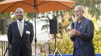 UC Davis Chancellor Gary May is introduced by Rob Davis, the mayor of the City of Davis during the Chamber Mixer held at the El Macero Country Club in Davis on August 16, 2017.