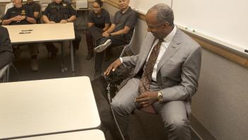 Chancellor Gary May meets the police staff at the UC Davis Police Department on August 15, 2017. Chancellor May is greeted by Charlie, a Yolo county bomb detection dog.