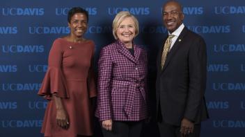 Chancellor Gary May and his wife LeShelle pose for a photo with Hillary Clinton during her October 9, 2017 visit to campus.