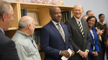 Interim Chancellor Ralph Hexter, professor Dave Rizzo, new Chancellor Gary May and acting provost Ken Burtis stand in front of Rizzo’s class as it is announced that Rizzo won the UC Davis Teaching Prize on April 14, 2017.