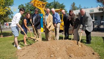 UC Davis Provost Ralph J. Hexter breaks ground with shovel and people