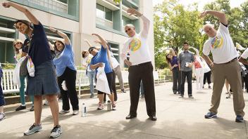 UC Davis Provost Ralph J. Hexter exercises outdoors with the UC Davis community