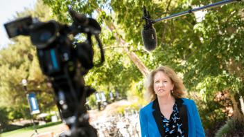 Provost Mary Croughan speaking on camera outside