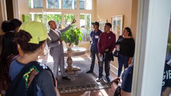 The Chancellor greets a group of prospective transfer students in his home