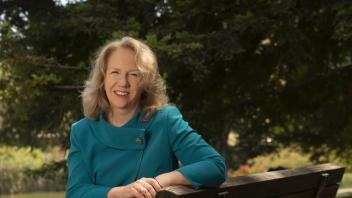 provost mary croughan on a bench