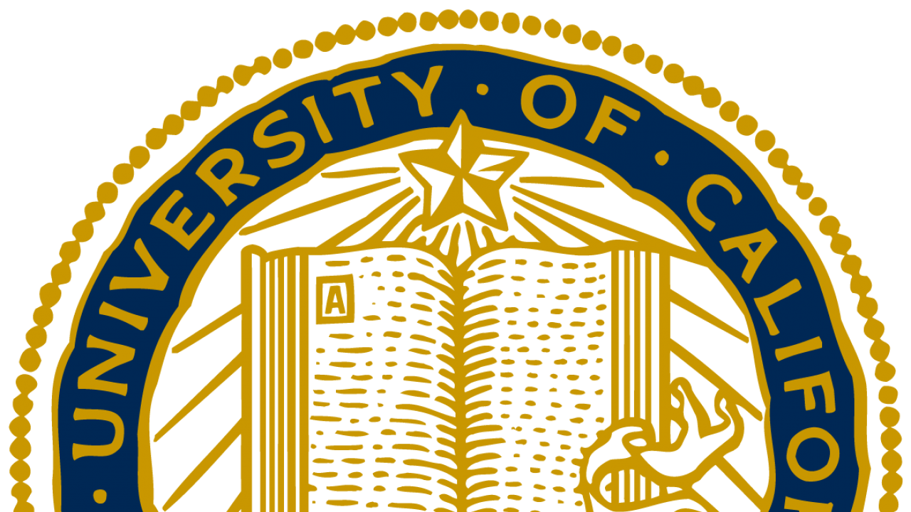 the UC Davis seal of a book wrapped in a ribbon reading "let there be light"