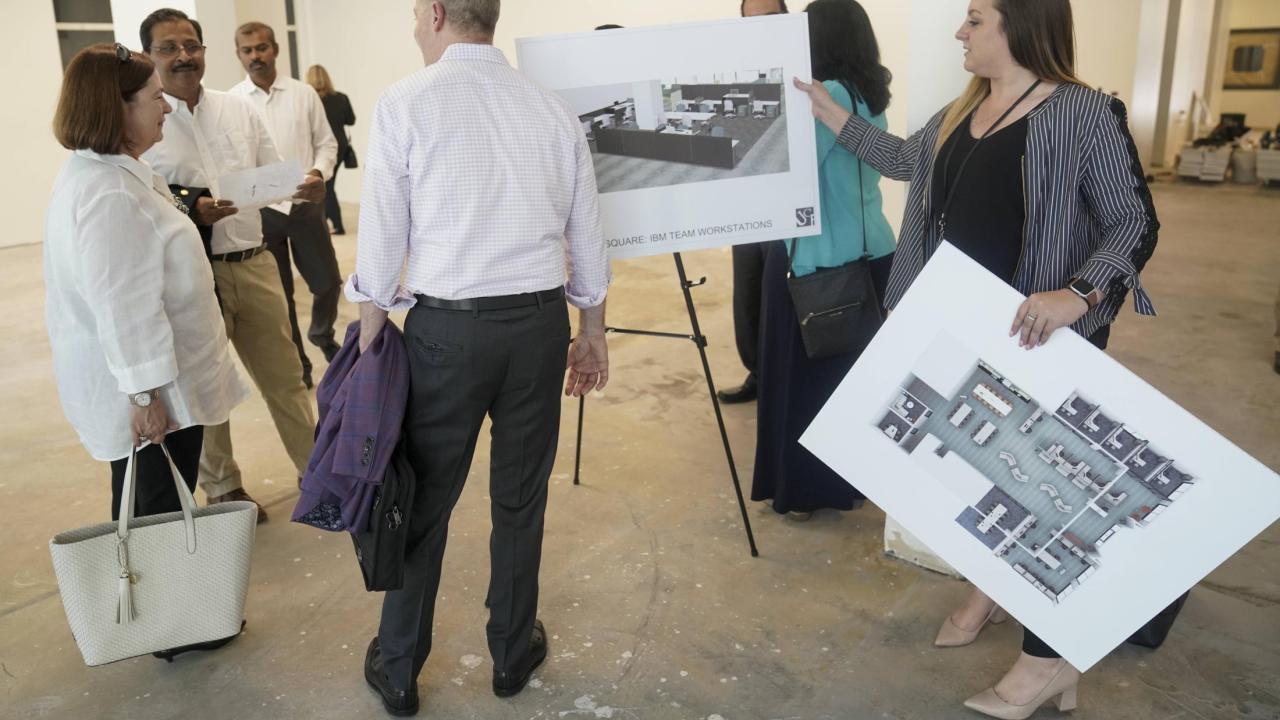 In August, Aggie Square and IBM staff met for a tour and reception of the new space. Karin Higgins, UC Davis photo People touring new Aggie Square space