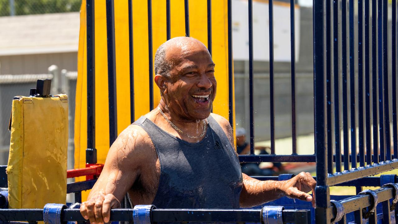 Chancellor May smiling in dunk tank