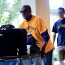 UC Davis Chancellor Gary May helps with Move-in Weekend