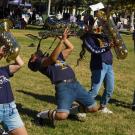 4 UC Davis band members playing saxophones.