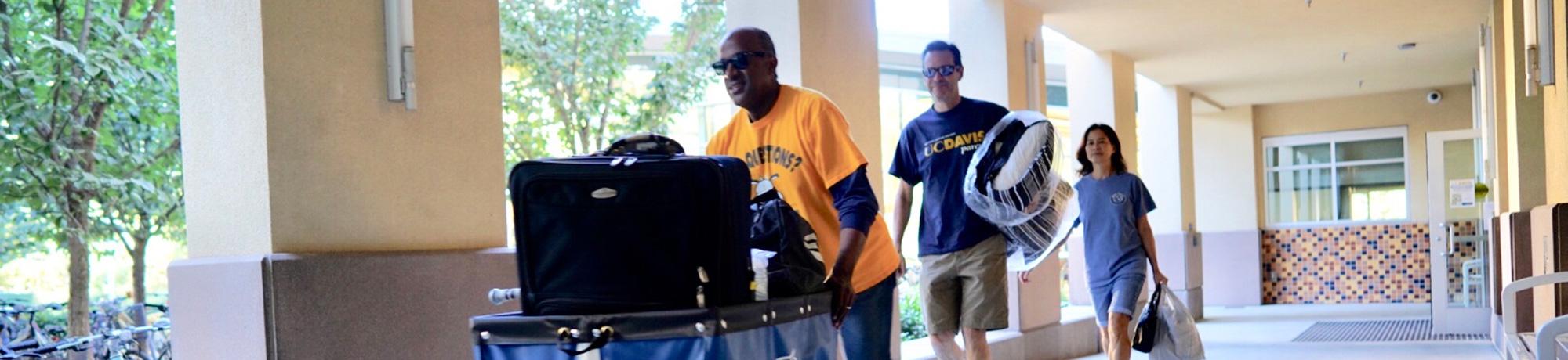 UC Davis Chancellor Gary May helps with Move-in Weekend